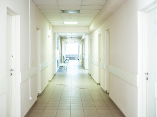 Fototapeta na wymiar light at the end of the empty corridor inside