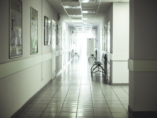 hospital empty corridor with light in the end