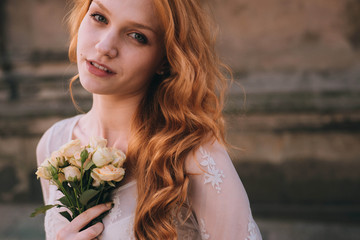 Naklejka premium beautiful portrait of young and happy red-haired woman