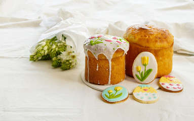 easter cake, kulich with cookies with roal icing