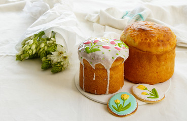 easter cake, kulich with cookies with roal icing