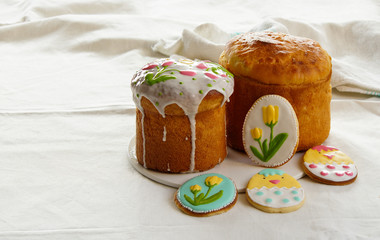 easter cake, kulich with cookies with roal icing