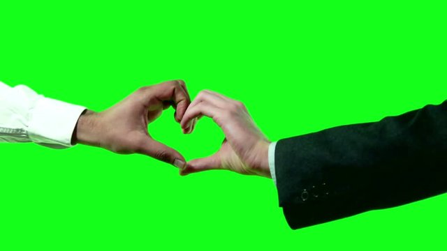 Heart Shaped Love Symbol by 2 Business Men in Suit and Shirt on Green Screen 4k Video Footage Set.