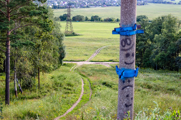 View from a high point to a splashing rural road
