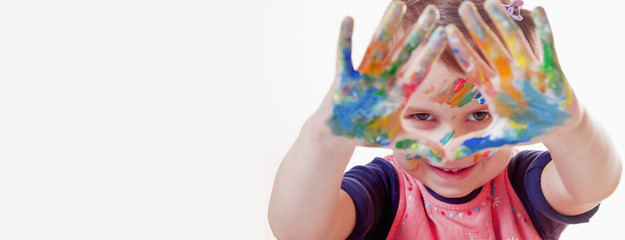 Colorful painted hands. (art, childhood, color, creativity concept)