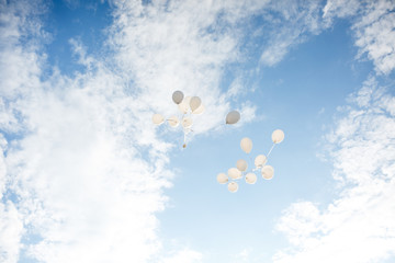 Flying baloons at sunny day