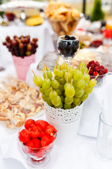 Different kind of fruits at table
