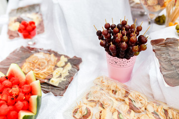 Different kind of fruits at table