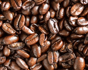 Whole coffee beans close up