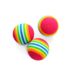 Colorful balls for cat on white background, top view. Pet toys