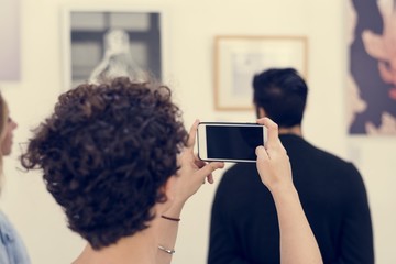people checking out the exhibition