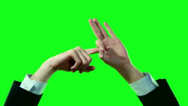 Sex Geste von Mann im Anzug mit zwei Händen für Aufkläung und Sexualkunde Unterricht vor Green Screen 4k Video Footage.