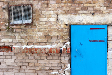 Brick wall of the technical room. Curved brick masonry
