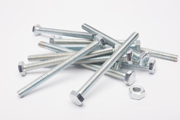 Bolt and nuts on a white background