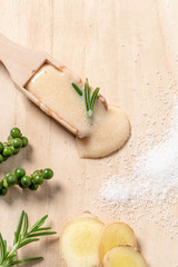 scrub wooden on spoon with ingredients