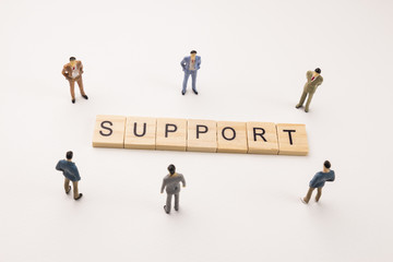 businessman figures meeting on support word