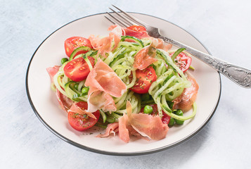 Cucumber and tomato salad with prosciutto