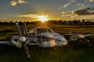 Old airplane at sunset