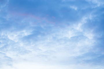 Sky and cloud at sunset with dark and vibrant light at  dusk