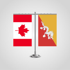 Table stand with flags of Canada and Butane.Two flag. Flag pole. Symbolizing the cooperation between the two countries. Table flags