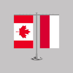 Table stand with flags of Canada and Poland.Two flag. Flag pole. Symbolizing the cooperation between the two countries. Table flags