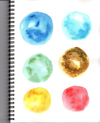 Watercolor drawing painting Illustration of six colors circle on wire notepad in dry on wet technique. Dark blue, light blue, green, brown, yellow, red - round shape for learning light and tone of art