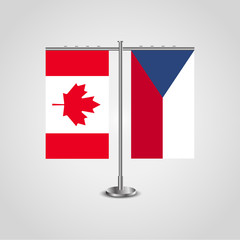 Table stand with flags of Canada and Czech Republic.Two flag. Flag pole. Symbolizing the cooperation between the two countries. Table flags