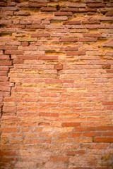 Dark red old bricks wall.