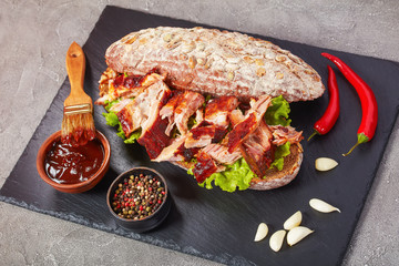 delicious juicy giant BBQ rib sandwich