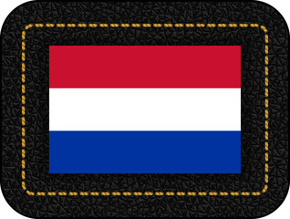 Flag of Netherlands. Vector Icon on Black Leather Backdrop