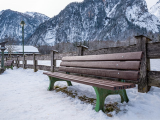 Wooden Chair outdoor in national park and moutain background winter season snow 