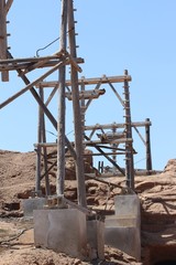 Wood pylons of cable car pods took sun dried salt out of a volcano crater historical engineered...