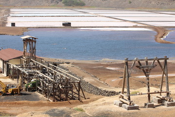 Cape Verde salt pans, base infrastucture  wood pylon; salt pans dried and a tourist salt swimming bath