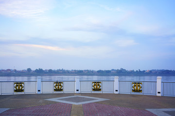 Beautiful viewpoint at Tha Sadet promenade along Mekong river in the evening in Nong Khai ,Thailand