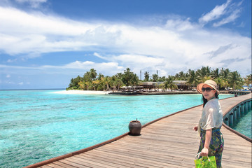 Fototapeta premium Beautiful girl on holiday in Maldives