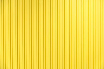 Yellow background texture pattern material and abstract wallpaper or wall yellow color
