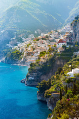 Morning view of Positano cityscape on coast line of mediterranean sea, Italy