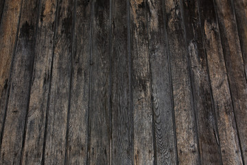 Fragment of natural wooden texture with a nails