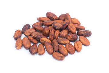 Cocoa beans before roast. Isolated on white background.