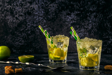 Fresh lime cocktail with ice, selective focus.