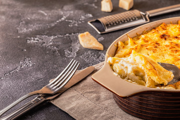 Mac and cheese, american style macaroni pasta in cheesy sauce.