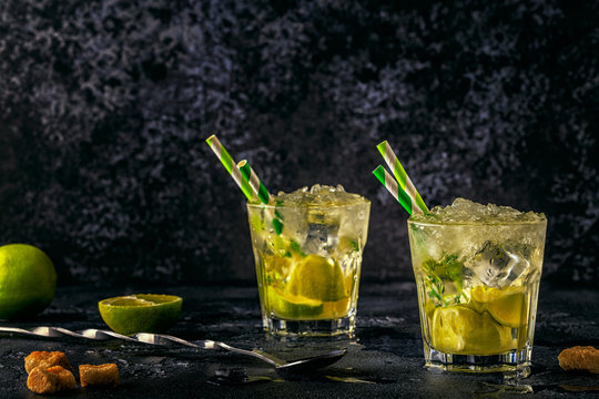 Fresh lime cocktail with ice, selective focus.