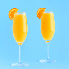 Yellow cocktail on a bright background.