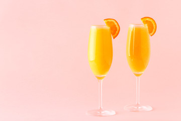 Yellow cocktail on a bright background.