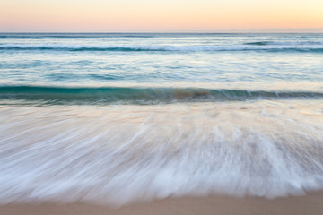 Fototapeta na wymiar Ocean Waves Early Morning