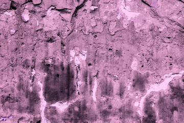Wall fragment with scratches and cracks