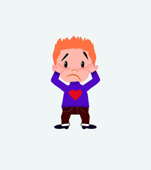 White boy with a heart pullover, surprised.