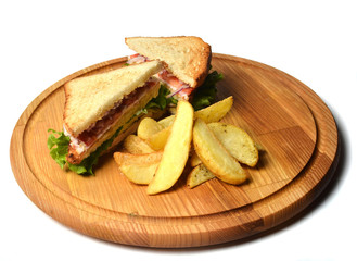 Sandwich with baked potatoes on a wooden board isolated on white background. Restaurated food. Fast food.