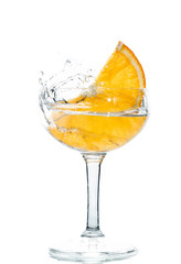 water splash with sliced fresh orange
