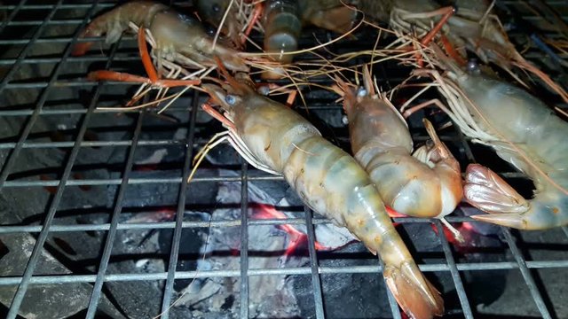 Grilled seafood on the charcoal stove.